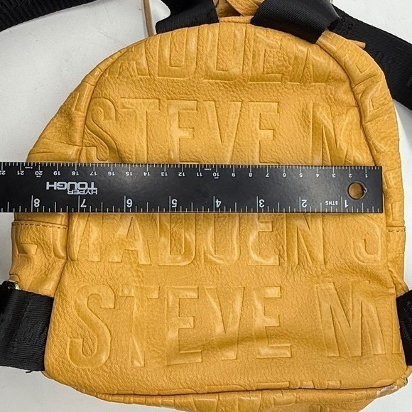 Steve Madden Yellow Embossed Logo Mini Backpack Mustard Tassel -corner peeling - Picture 7 of 11